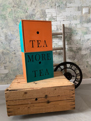 Dose in Yellowchair Orange Nr. 15 und Blaugrün Nr. 125 gestrichen.