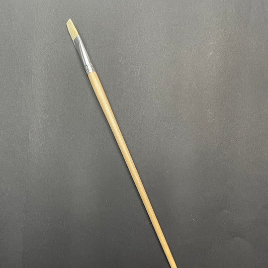 Repellent brush with the yellow synthetic bristle